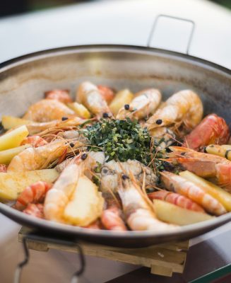 mixed seafood stew in traditional portuguese cataplana dish